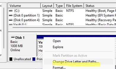 remove an assigned drive letter from disk management