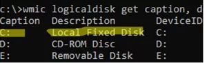 wmic logicaldisk get caption - identify local volume drive letters